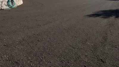 Graded soil bed prepared for professional sod installation by landscapers in Flagstaff, AZ