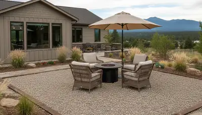 Professional pea gravel patio installation in Flagstaff AZ with smooth surface and defined landscape edging